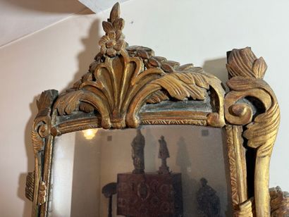 Large mirror in carved wood, gilded and green...