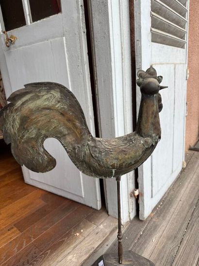 Sheet metal steeple rooster mounted on a...