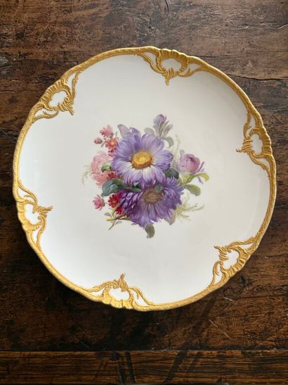 Suite of six porcelain dessert plates with...