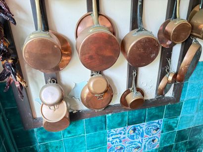 Brass set including: 
- 11 pans; 
- 8 lids;...