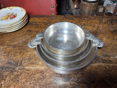 Suite of four bowls, the handles decorated...