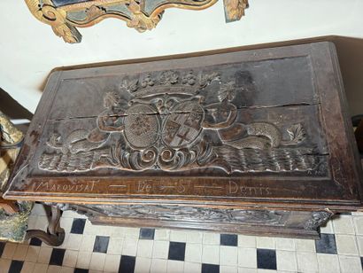 Large chest in natural wood, carved with...