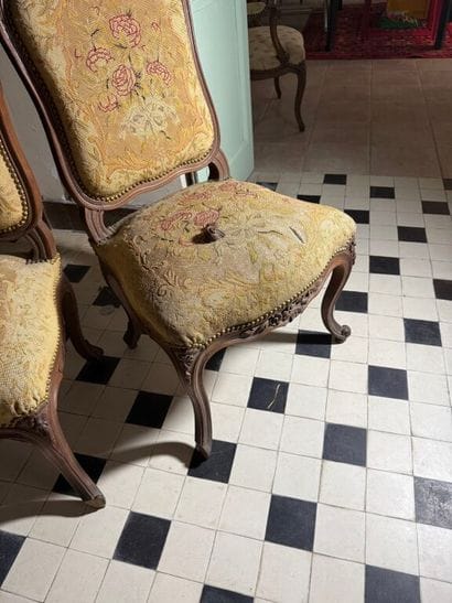 Pair of molded and carved wood chairs decorated...