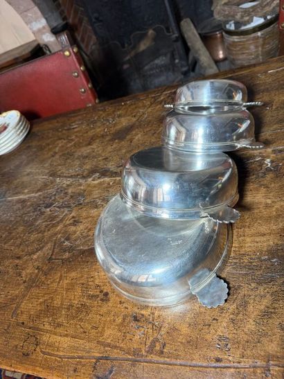 Suite of four bowls, the handles decorated...