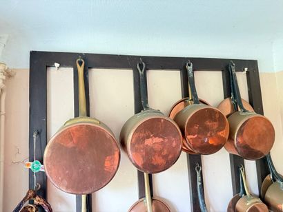 Brass set including: 
- 11 pans; 
- 8 lids;...