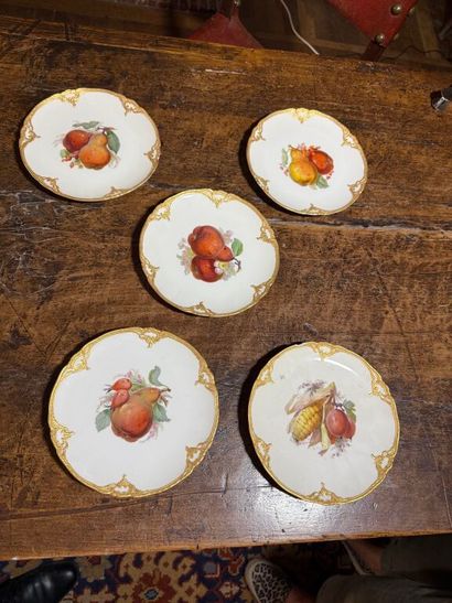 Suite of six porcelain dessert plates with...