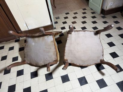 Pair of molded and carved wood chairs decorated...