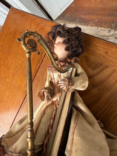 Small harp-playing automaton with bisque...