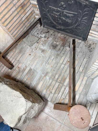 Pair of cast-iron andirons in the 17th century...