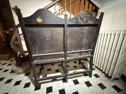 Double armchair forming a bench in carved...