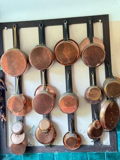 Brass set including: 
- 11 pans; 
- 8 lids;...
