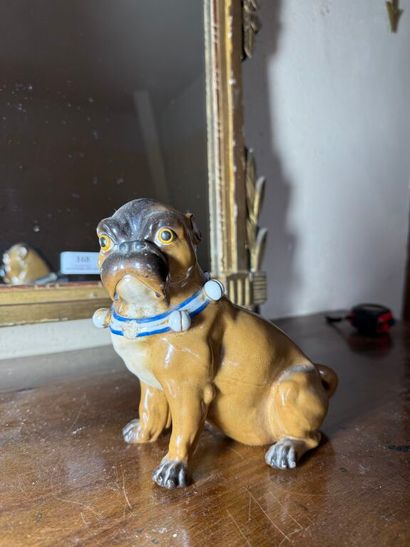 Statuette de carlin en porcelaine. 
Début...