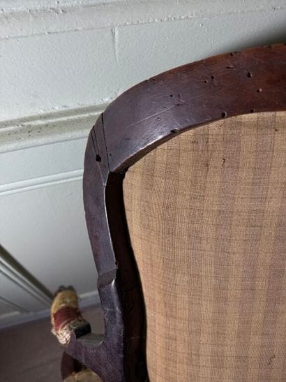 Natural wood armchair, molded and carved...