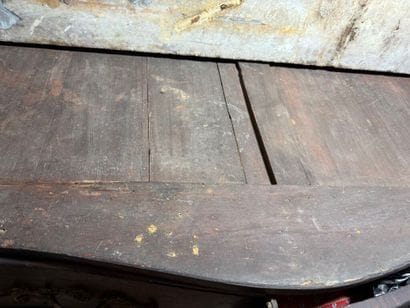 An important chest of drawers with a curved...