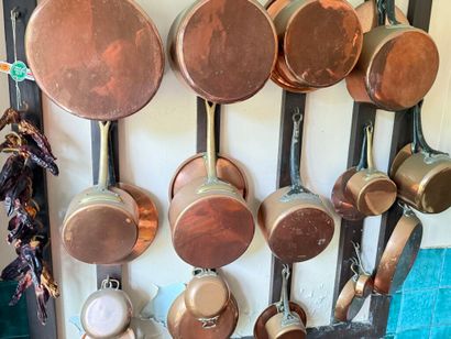 Brass set including: 
- 11 pans; 
- 8 lids;...