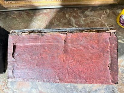 Leather-covered wooden case with studded...