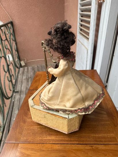 Small harp-playing automaton with bisque...