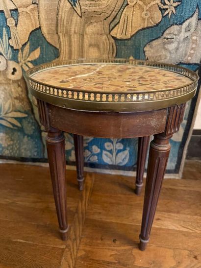 Set of two pedestal tables: 
- one in mahogany...