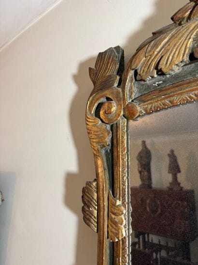 Large mirror in carved wood, gilded and green...