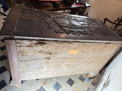 Large chest in natural wood, carved with...