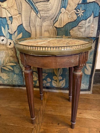 Set of two pedestal tables: 
- one in mahogany...