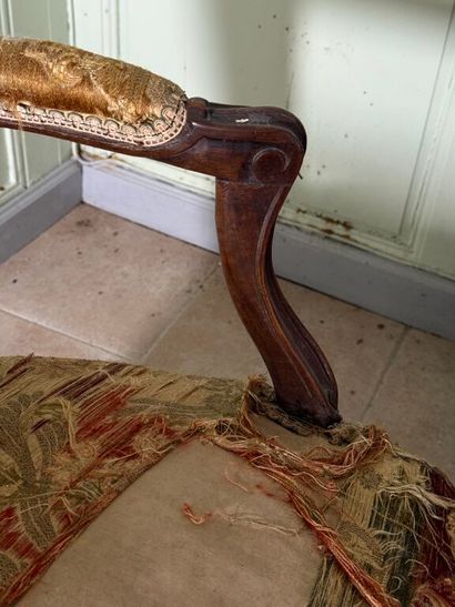 Natural wood armchair, molded and carved...