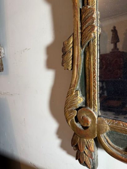 Large mirror in carved wood, gilded and green...