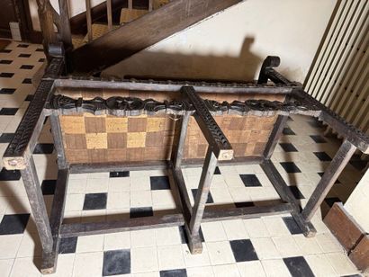 Double armchair forming a bench in carved...