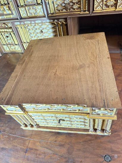 Richly carved walnut and bone bargueño with...