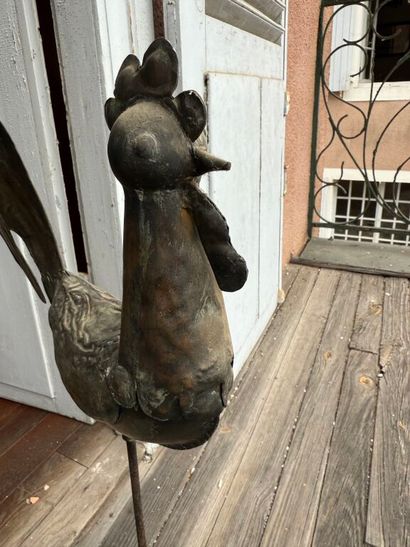 Sheet metal steeple rooster mounted on a...