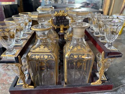 Liqueur cellar in partly black-stained mahogany...