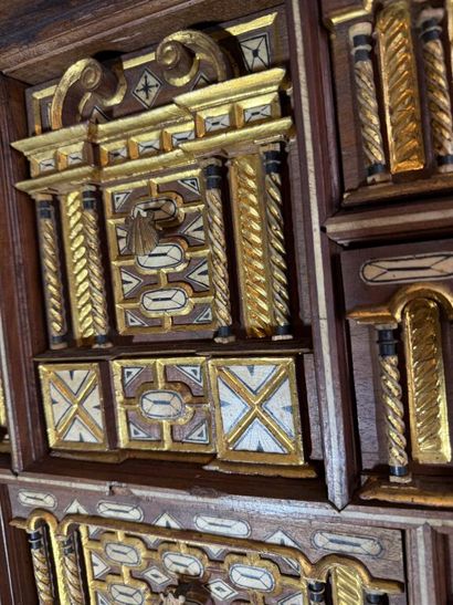 Richly carved walnut and bone bargueño with...