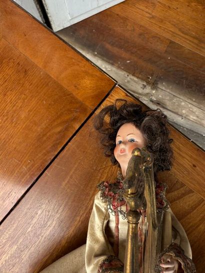Small harp-playing automaton with bisque...