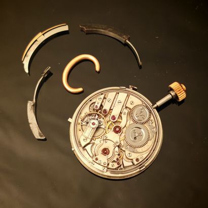Metal case containing an as-is striking watch...