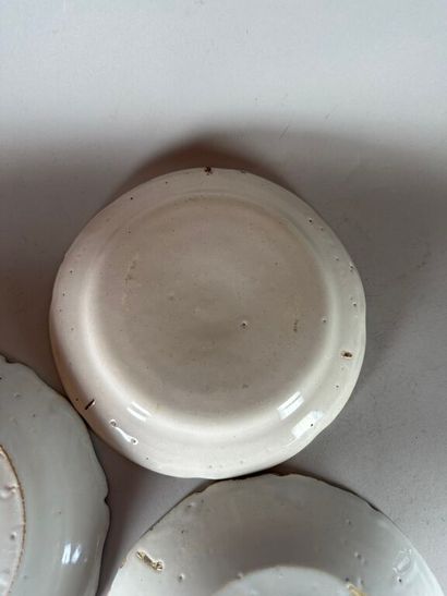 NEVERS.
Two rimmed earthenware plates with...