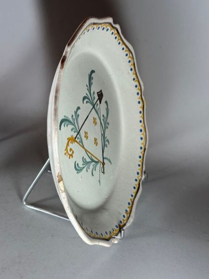 NEVERS.
Earthenware rimmed plate with pre-Revolutionary...