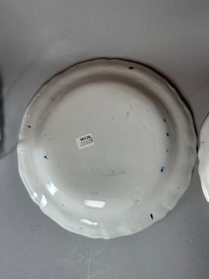 MOUSTIERS. 
Set of four earthenware rimmed...