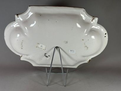 MOUSTIERS.
Oblong earthenware dish decorated...