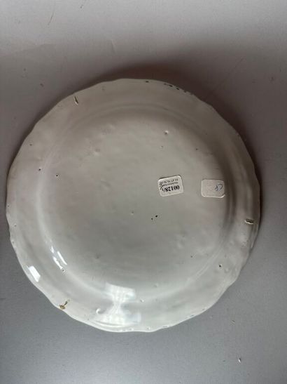 MOUSTIERS. 
Set of four earthenware rimmed...