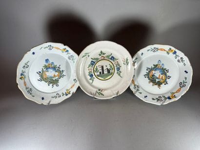 NEVERS.
Two rimmed earthenware plates with...