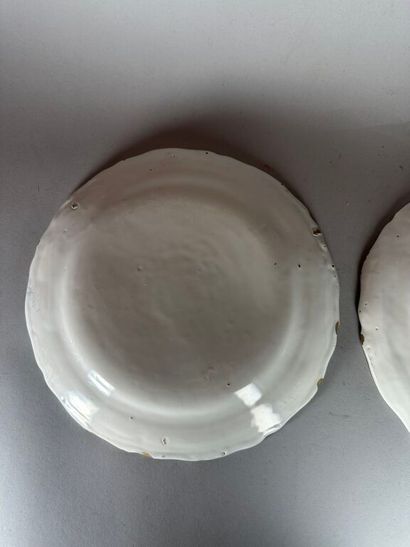 MOUSTIERS. 
Set of four earthenware rimmed...