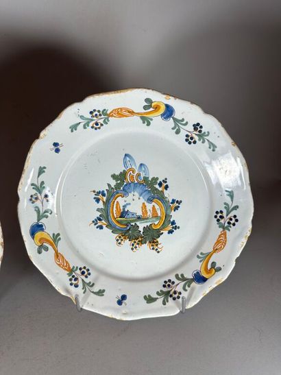 NEVERS.
Two rimmed earthenware plates with...