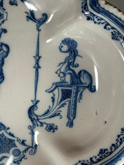 MOUSTIERS.
Oblong earthenware dish decorated...