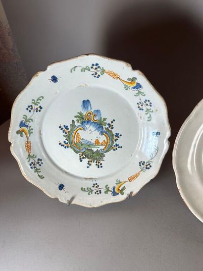 NEVERS.
Two rimmed earthenware plates with...