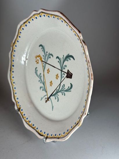 NEVERS.
Earthenware rimmed plate with pre-Revolutionary...
