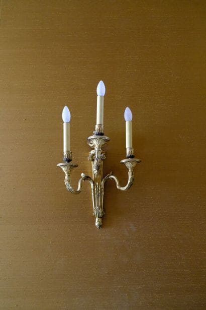Paire d'appliques à trois bras de lumière...