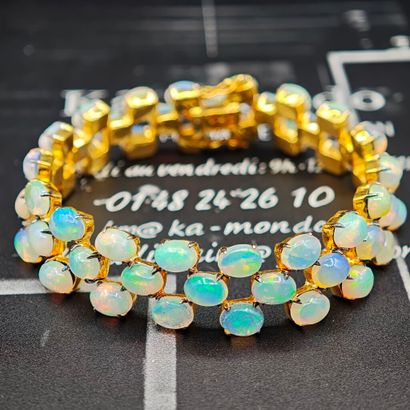 Articulated bracelet in 800‰ vermeil, with...