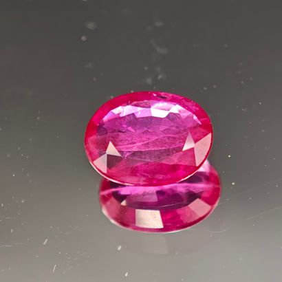 Heated oval-shaped RUBY, weighing 1.60 ct...
