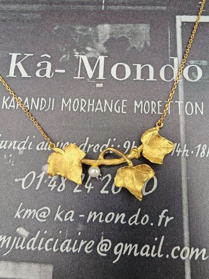 A 750‰ yellow gold necklace consisting of...