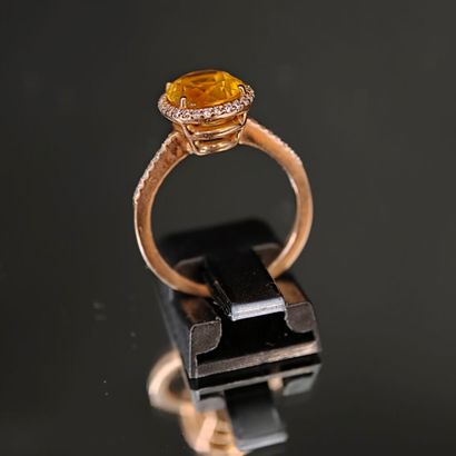 A 750‰ rose gold ring set with an oval-shaped...